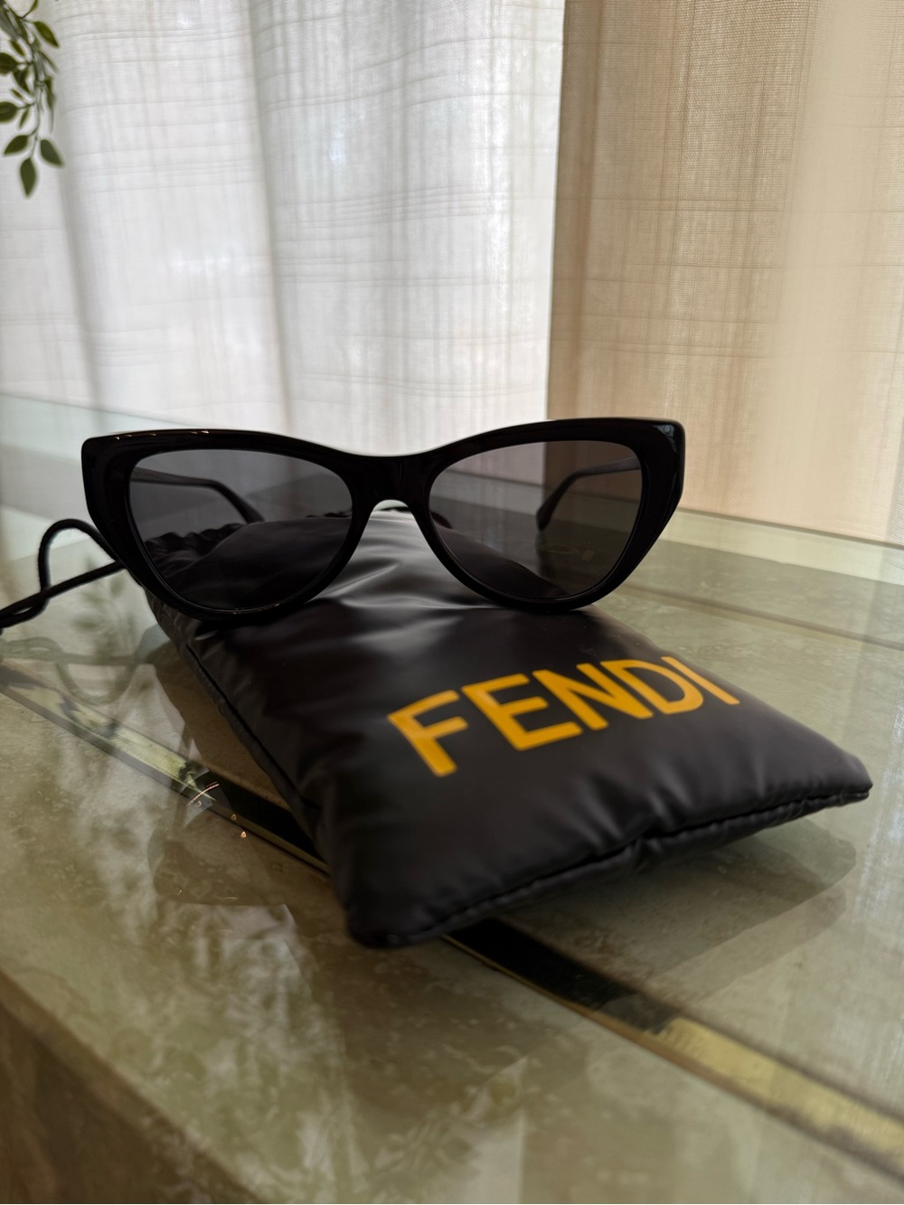 Fendi Black Cat-Eye Sunglasses with Gold Logo Accent